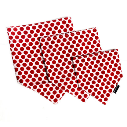 The Polka Pup cotton scrunchie dog bandana flatlay showing all three sizes Small, Medium, Large, soft cotton, playful red and white polka dot print, easy to slip on, comfy fit for all dogs